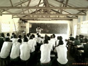 Our Founder motivating grade 8 students at Kidemu